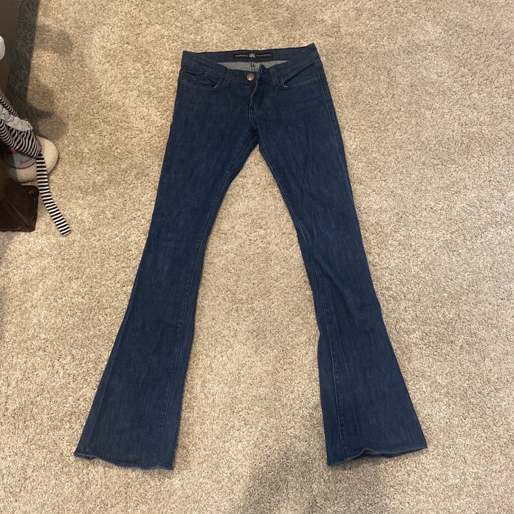 Extremely low rise. Medium/dark blue rock and Repub jeans.33 inch inseamSize 26